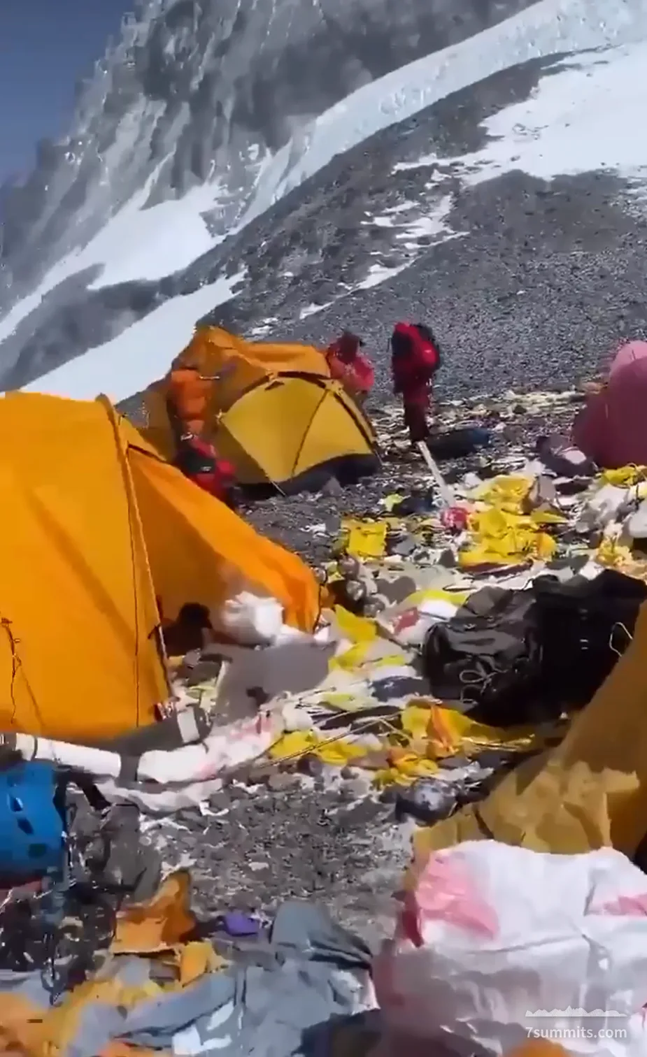 Screenshot from the video, showing trashed tents at South Col camp