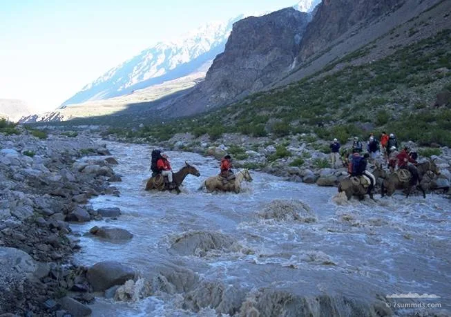 Harry on the mule crossing the river