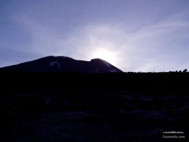 Sunrise over Kili's upper slopes.