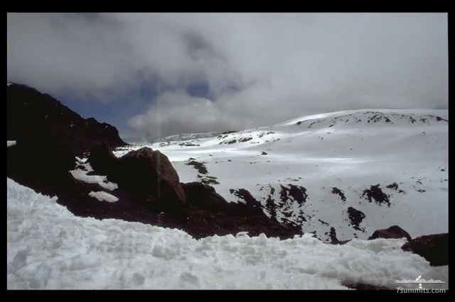 View of the inner craterfrom Gillman's Point, the souteastern point of Kilimanjaro's crater rim (and the point where the marangu or 'coca cola' route enters the crater) at 5685 meter