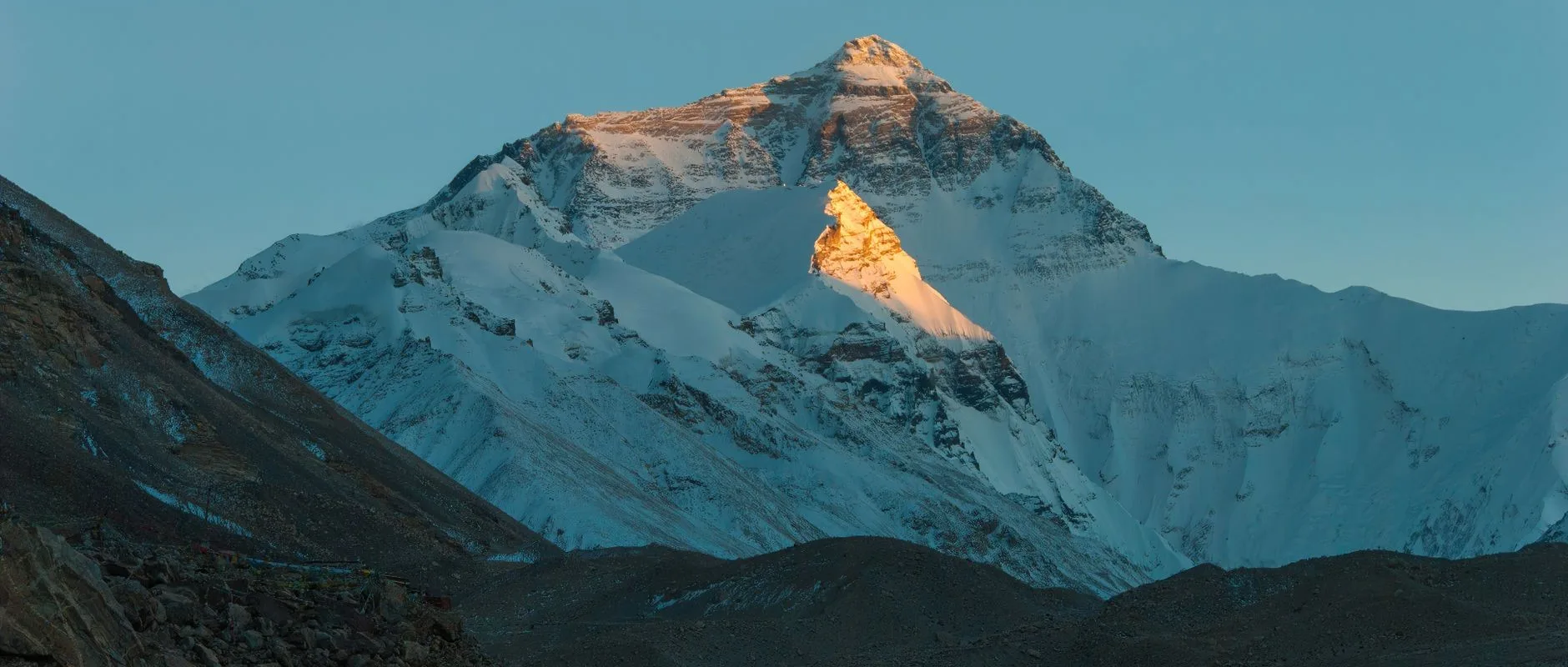 everest — A breathtaking sunrise illuminating the peak of Mount Everest, capturing its majestic beauty.